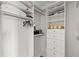 Well-organized walk-in closet with custom shelving and ample storage space at 6847 S Atlantic Ave, New Smyrna Beach, FL 32169