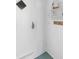 Bright entryway features white walls, diamond window, and coat rack at 708 Wayne Ave, New Smyrna Beach, FL 32168