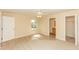 Cozy bedroom featuring tile floors, natural light, and a ceiling fan at 801 Coleman Ave, Deltona, FL 32725
