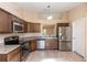 Modern kitchen with stainless steel appliances and stylish countertops at 801 Coleman Ave, Deltona, FL 32725
