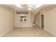 Spacious living room with tile flooring, neutral walls, and a ceiling fan at 801 Coleman Ave, Deltona, FL 32725