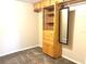 A spacious closet with shelves and a mirror in the bedroom provides plenty of storage at 805 N Clake St, Deland, FL 32724