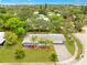 This aerial view captures the property with its well-maintained lawn and attractive landscaping at 88 Valencia Dr, Ormond Beach, FL 32176