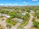Aerial view showcases home's proximity to the beach and cityscape, nestled among lush greenery at 88 Valencia Dr, Ormond Beach, FL 32176