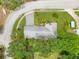 An aerial view of the property showcasing its landscaping and unique position on a cul-de-sac at 88 Valencia Dr, Ormond Beach, FL 32176
