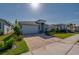 Charming single-story home with a two-car garage and manicured front yard at 887 Lake Hill Way, Deland, FL 32724