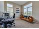 Bright home office with modern desk, comfortable seating, and natural light at 887 Lake Hill Way, Deland, FL 32724