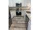 Beautiful kitchen featuring new stainless steel appliances and a stylish countertop at 926 Clover St, Deland, FL 32720