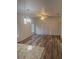 Open floor plan featuring wood-look floors and modern lighting fixtures at 926 Clover St, Deland, FL 32720