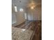 Spacious living room with wood-look floors and recessed lights, great natural light at 926 Clover St, Deland, FL 32720