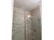 Modern shower with stylish tile, and glass doors providing a luxurious bathing experience at 926 Clover St, Deland, FL 32720