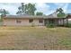 Exterior view of the backyard and patio, showcasing the home's outdoor space at 1075 Burgoyne Rd, Deland, FL 32720