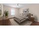 Comfortable bedroom featuring a window and coordinated decor at 11094 Se 173Rd Ln, Summerfield, FL 34491