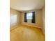 Bedroom featuring neutral walls, carpet floors and a window with dark curtains at 1120 Arden St, Longwood, FL 32750