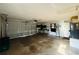 Spacious garage with ample storage space and a roll-up door at 1120 Arden St, Longwood, FL 32750