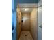 Tiled shower stall with bronze fixtures in a bathroom at 1120 Arden St, Longwood, FL 32750