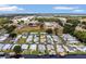 Expansive aerial view of a residential community with waterfront access, showcasing the neighborhood's layout at 119 Jana Cir, Auburndale, FL 33823