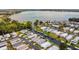 A waterfront community with easy access to canals and beautiful lake views in a serene, residential setting at 119 Jana Cir, Auburndale, FL 33823