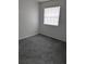 Bedroom with neutral walls, blinds on the window, and plush gray carpeting at 1250 Lemonwood Ave, Deland, FL 32724