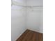 Empty walk-in closet space showing wire shelving and neutral paint at 1250 Lemonwood Ave, Deland, FL 32724