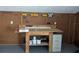 Workshop with wooden workbench and pegboard for tool storage and organization at 1250 Lemonwood Ave, Deland, FL 32724