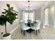 Cozy dining room featuring stylish lighting and neutral tones, perfect for Gathering meals at 1311 Fallwood Dr, Deltona, FL 32725
