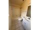 Bathroom features tiled floors, white vanity, shower and bath combination at 132 Wax Myrtle Ct, Sanford, FL 32773