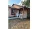 A cozy front entrance with a white picket fence and a charming porch at 132 Wax Myrtle Ct, Sanford, FL 32773