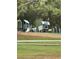 A playful playground with a train and a house for children to explore and enjoy at 132 Wax Myrtle Ct, Sanford, FL 32773