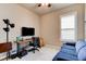 Bedroom with window, closet, desk, and sofa at 133 Azure Mist Way, Daytona Beach, FL 32124
