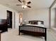 Bedroom featuring neutral walls, ceiling fan, and a door to the walk-in closet at 133 Azure Mist Way, Daytona Beach, FL 32124