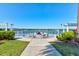 Outdoor fire pit near the lake, perfect for evening gatherings and enjoying scenic waterfront views at 133 Azure Mist Way, Daytona Beach, FL 32124