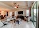 Bright living room featuring tile floors, recessed lighting, and sliding glass doors at 133 Azure Mist Way, Daytona Beach, FL 32124