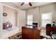 Spacious office featuring natural light and functional furniture, offering a comfortable and productive workspace at 133 Azure Mist Way, Daytona Beach, FL 32124