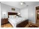 Cozy bedroom featuring a comfortable bed, wood floors, and closet at 133 Brasswood Ct, Daytona Beach, FL 32117