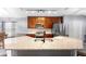 Modern kitchen features stainless steel appliances, granite countertops, and ample cabinet space at 133 Brasswood Ct, Daytona Beach, FL 32117
