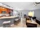 Open floor plan connecting the kitchen with the living area, perfect for entertaining guests at 133 Brasswood Ct, Daytona Beach, FL 32117
