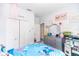 bedroom featuring a closet, dresser, bed, and doorway at 1388 15Th St, Orange City, FL 32763