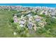 Scenic aerial view of coastal community with beautiful home near the beach at 14 Marsh Ct, Ponce Inlet, FL 32127