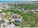 Stunning aerial view of the property showcasing lush greenery and proximity to the ocean at 14 Marsh Ct, Ponce Inlet, FL 32127