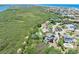 Coastal neighborhood and home aerial view, showcasing location near the beach at 14 Marsh Ct, Ponce Inlet, FL 32127