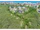 Aerial view of the property backing up to marsh, showcasing its secluded location and natural surroundings at 14 Marsh Ct, Ponce Inlet, FL 32127