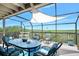 Outdoor dining area with beautiful views; ideal for entertaining or relaxing at 14 Marsh Ct, Ponce Inlet, FL 32127