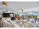Spacious living room with comfortable seating, views, and a cozy atmosphere at 14 Marsh Ct, Ponce Inlet, FL 32127