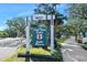 Historical Ponce de Leon Inlet Lighthouse sign, surrounded by trees and walkways at 14 Marsh Ct, Ponce Inlet, FL 32127