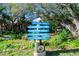 Charming directional sign near Ponce Inlet, surrounded by lush greenery at 14 Marsh Ct, Ponce Inlet, FL 32127