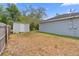 Backyard featuring a shed with extra yard space at 1435 6Th Ave, Deland, FL 32724