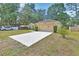 Charming single-Gathering home with a well-manicured front lawn and a two-car garage at 1450 14Th St, Orange City, FL 32763