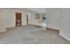 Open-concept living area featuring neutral tones, carpet and hardwood floors, and ample space at 1450 14Th St, Orange City, FL 32763