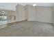 Bright living space with tiled floors and a slider leading to a patio. Neutral paint at 1450 14Th St, Orange City, FL 32763